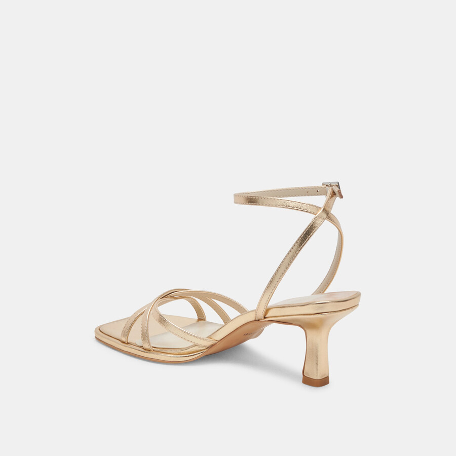 manji heels aus hellgoldenem metallic-leder
